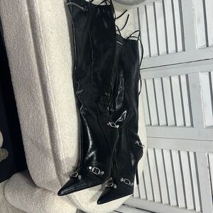 black leather zippered thigh high boots with heel